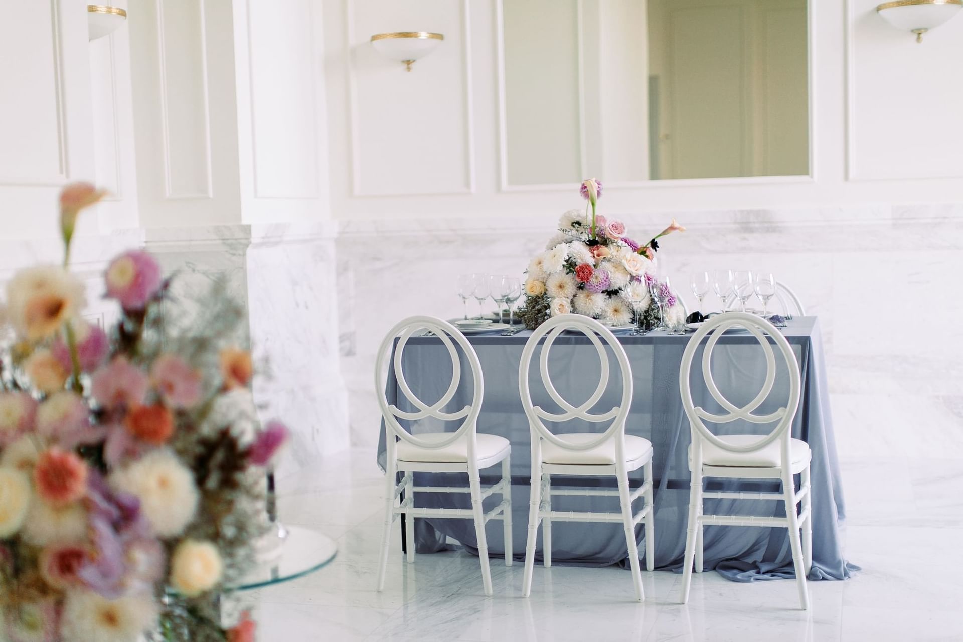 Tables with flowers and Chairs at Polonia Palace Hotel Warsaw