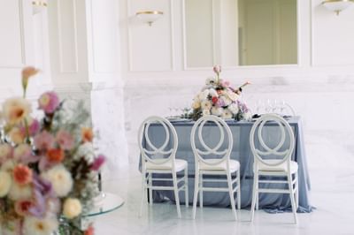 Tables with flowers and Chairs at Polonia Palace Hotel Warsaw