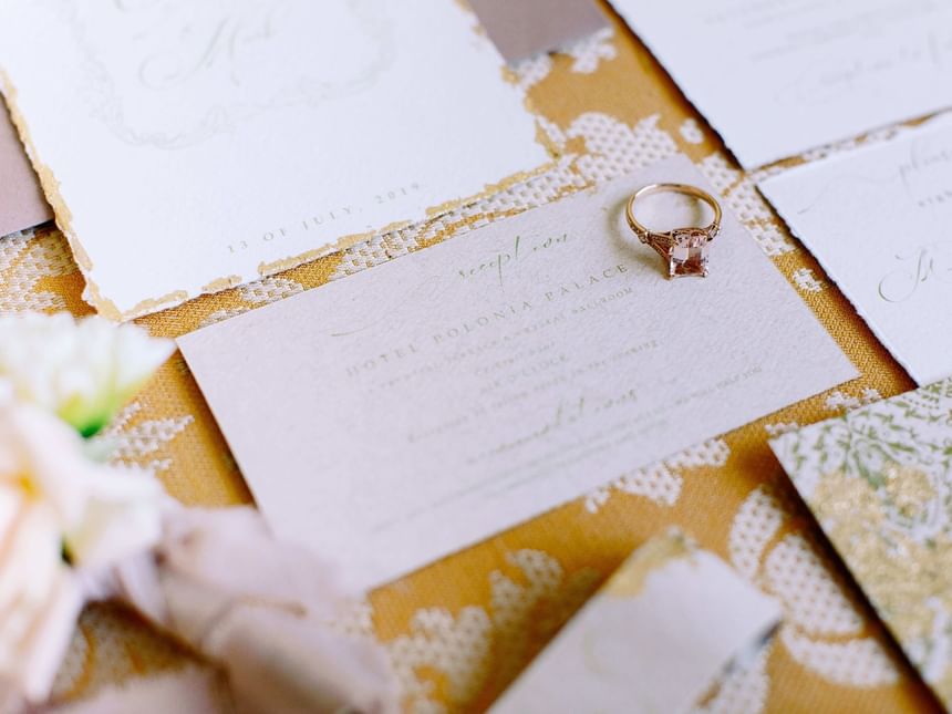 Ring on top of Wedding Card at Polonia Palace Hotel Warsaw